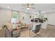 Open concept living room with kitchen island and breakfast bar at 2060 Westwood Ave, Atlanta, GA 30310