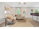 Spacious living area with L-shaped sofa and modern coffee table at 2060 Westwood Ave, Atlanta, GA 30310
