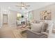 Bright living room featuring hardwood floors, neutral decor, and ample natural light at 2060 Westwood Ave, Atlanta, GA 30310