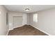 Finished basement room with wood-look floors and neutral walls at 2343 Carver Nw Dr, Atlanta, GA 30314