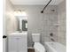 Modern bathroom with subway tile and a white vanity at 2343 Carver Nw Dr, Atlanta, GA 30314