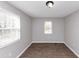 Bedroom with wood floor, window, and closet at 2343 Carver Nw Dr, Atlanta, GA 30314