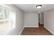 Simple dining room with wood-look floors and neutral walls at 2343 Carver Nw Dr, Atlanta, GA 30314