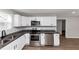 Modern kitchen featuring stainless steel appliances and dark countertops at 2343 Carver Nw Dr, Atlanta, GA 30314