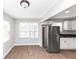 Modern kitchen with stainless steel appliances and white cabinets at 2343 Carver Nw Dr, Atlanta, GA 30314
