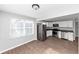 Modern kitchen with stainless steel appliances and white cabinets at 2343 Carver Nw Dr, Atlanta, GA 30314