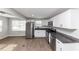 Updated kitchen with stainless steel appliances and white shaker cabinets at 2343 Carver Nw Dr, Atlanta, GA 30314