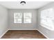 Sunlit living room with wood-look floors and neutral walls at 2343 Carver Nw Dr, Atlanta, GA 30314