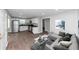 Open living room with gray sectional sofa and coffee table at 2343 Carver Nw Dr, Atlanta, GA 30314