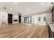 Open basement featuring a fireplace and sliding doors at 954 Carl Sanders Dr, Acworth, GA 30101