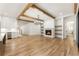 Bright and airy Gathering room features hardwood floors, fireplace, built-in shelving, and access to kitchen at 954 Carl Sanders Dr, Acworth, GA 30101