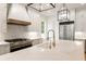 Sleek kitchen with white cabinets, marble countertops, and gold fixtures at 954 Carl Sanders Dr, Acworth, GA 30101