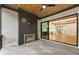 Covered patio with fireplace, providing an inviting outdoor space at 954 Carl Sanders Dr, Acworth, GA 30101
