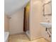 Small bathroom with tiled floors, corner shower, and stylish basin sink at 2597 Elsinore St, East Point, GA 30344