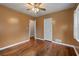 Bedroom with hardwood floors, baseboard trim and a ceiling fan at 2597 Elsinore St, East Point, GA 30344