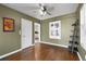 Spacious dining room with hardwood floors and built-in shelving at 2597 Elsinore St, East Point, GA 30344