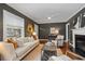 Bright living room with large window, hardwood floors, and stylish furnishings at 2597 Elsinore St, East Point, GA 30344