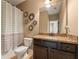 Clean bathroom with granite countertop and dark brown vanity at 2671 Willow Field Se Xing # 14, Marietta, GA 30067