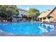 Beautiful community pool featuring lounge chairs and a shaded pavilion area at 2671 Willow Field Se Xing # 14, Marietta, GA 30067
