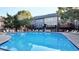 Inviting community pool with ample seating and beautiful townhome views for relaxation at 2671 Willow Field Se Xing # 14, Marietta, GA 30067