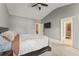 Comfortable main bedroom with a king-size bed and en-suite bathroom at 2671 Willow Field Se Xing # 14, Marietta, GA 30067