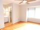 Bright bedroom with hardwood floors and large window at 2058 Powers Ferry Se Trce, Marietta, GA 30067