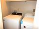 Laundry closet with Whirlpool washer and dryer at 2058 Powers Ferry Se Trce, Marietta, GA 30067