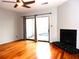 Living room with hardwood floors, fireplace, and sliding glass doors at 2058 Powers Ferry Se Trce, Marietta, GA 30067
