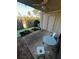 Cozy patio with outdoor seating and a ceiling fan for relaxing on warm days at 2058 Powers Ferry Se Trce, Marietta, GA 30067