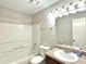 Clean bathroom with a tub, shower, and vanity at 224 Seasons Pkwy, Norcross, GA 30093