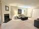 Living room features a fireplace and ample space for furniture at 224 Seasons Pkwy, Norcross, GA 30093
