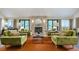 Community Lobby with comfortable seating and fireplace at 224 Seasons Pkwy, Norcross, GA 30093