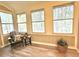 Relaxing sunroom with ample natural light and seating at 224 Seasons Pkwy, Norcross, GA 30093