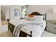 Cozy bedroom with a queen-size bed and plenty of natural light at 8232 Walnut Hall Dr, Fairburn, GA 30213