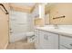 Full bathroom with tub-shower combo, tile flooring and a white vanity cabinet at 3284 Huntwood Dr, Decatur, GA 30034