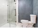 Close up of a toilet and glass shower in the bathroom at 3284 Huntwood Dr, Decatur, GA 30034