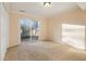 Bedroom featuring a large sliding glass door and neutral carpet at 3284 Huntwood Dr, Decatur, GA 30034