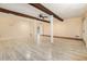 Living room with stylish flooring, ceiling fan, and exposed beams at 3284 Huntwood Dr, Decatur, GA 30034
