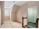 Upstairs bedroom with carpet, and a view of the staircase at 159 Cedar Creek Rd, Cartersville, GA 30121