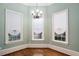 Bright dining room with hardwood floors and a chandelier at 159 Cedar Creek Rd, Cartersville, GA 30121