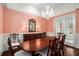 Formal dining room with hardwood floors, chandelier, and French doors at 159 Cedar Creek Rd, Cartersville, GA 30121
