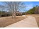 Long driveway leading to a brick house at 159 Cedar Creek Rd, Cartersville, GA 30121