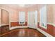 Elegant entry with hardwood floors, two-toned walls, and crown molding at 159 Cedar Creek Rd, Cartersville, GA 30121