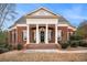 Brick house with a large front porch and columns at 159 Cedar Creek Rd, Cartersville, GA 30121
