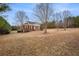 Brick house with large yard and trees at 159 Cedar Creek Rd, Cartersville, GA 30121