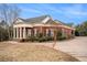 Brick home with white columns and landscaping at 159 Cedar Creek Rd, Cartersville, GA 30121