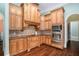 Kitchen with light wood cabinets, granite countertops, and stainless steel appliances at 159 Cedar Creek Rd, Cartersville, GA 30121