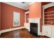 Spacious library with built-in shelving and a fireplace at 159 Cedar Creek Rd, Cartersville, GA 30121