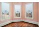 Bright office space with hardwood floors and three windows at 159 Cedar Creek Rd, Cartersville, GA 30121
