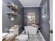 Stylish bathroom with freestanding tub and patterned floor at 416 Spring Place Ne Rd, White, GA 30184